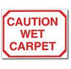 Caution wet carpet